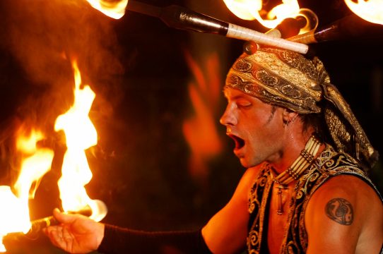 Fire performer with torches